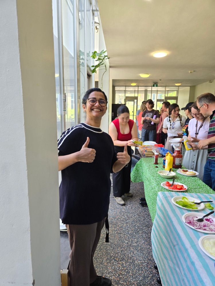 Lab member at food table