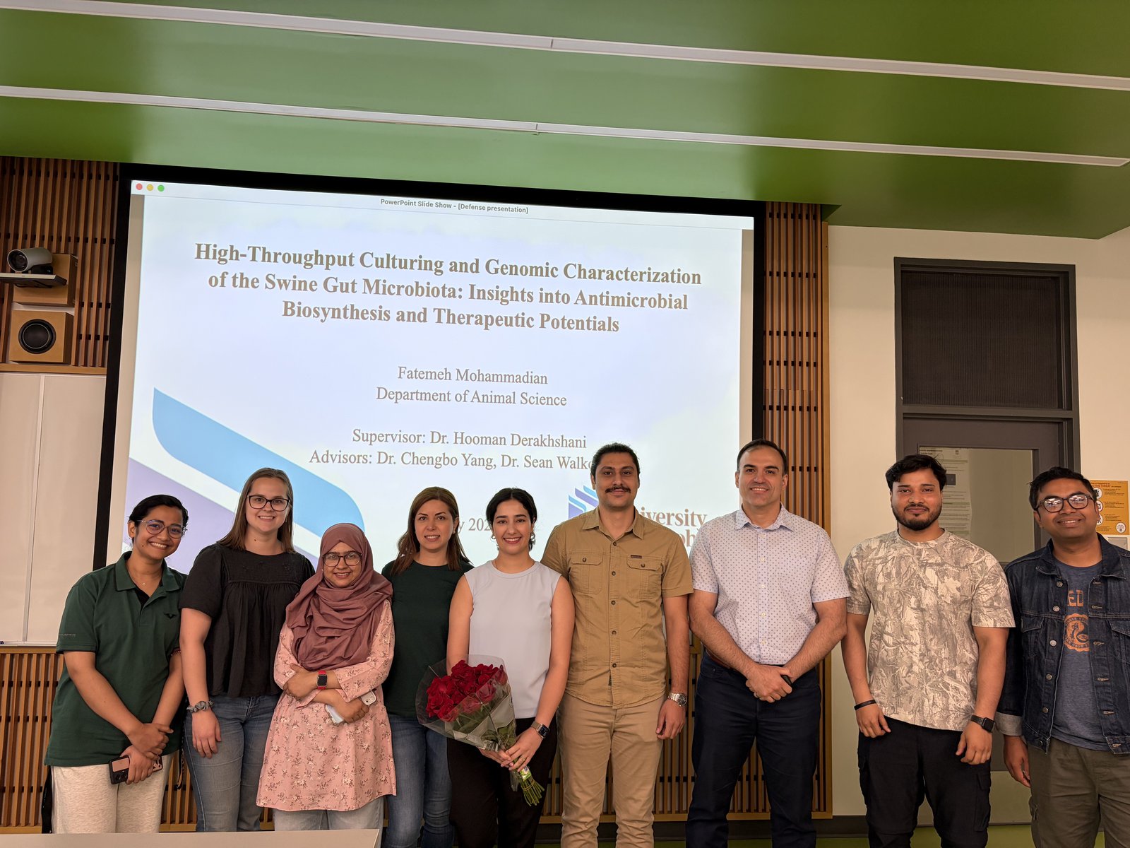TLMR lab members celebrating after the defense